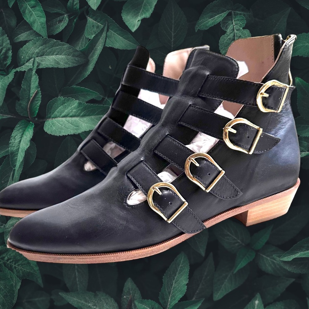 Black leather booties with gold buckle detail. Dresses up or down! Size 37 NWT